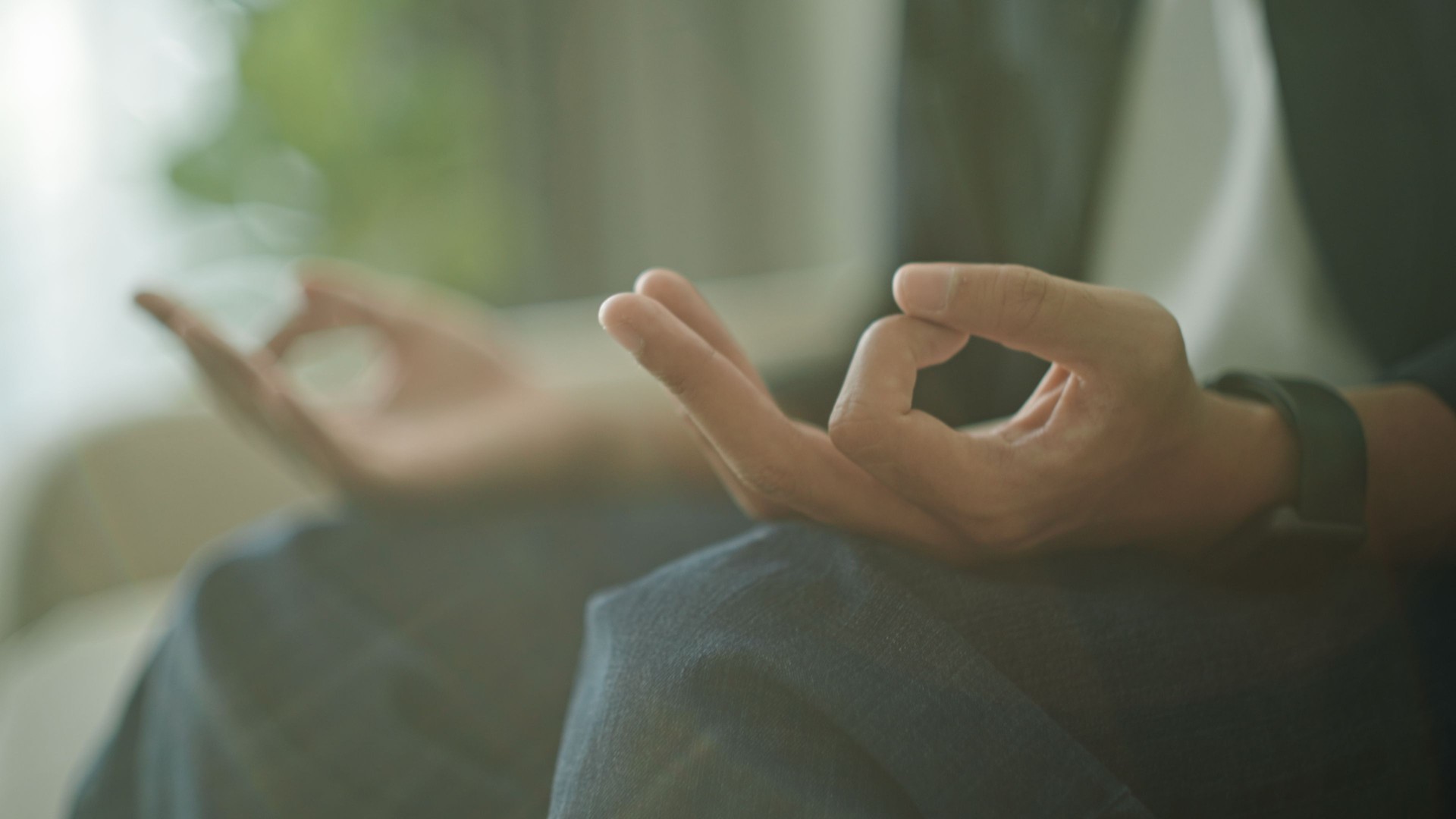 Asian man meditation at home.